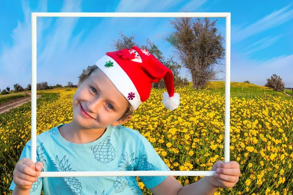 Handsome Boy Red Cap Posing White Frame Green Field Background — Stok fotoğraf