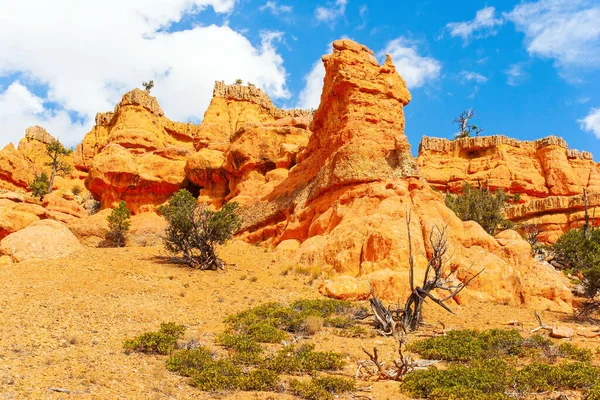 Magical landscapes of the west of the USA. Red Canyon Arches trail in Losee Canyon. Red-brown canyons, ledges, mesas and outliers are composed of soft sedimentary rocks