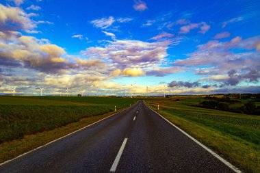 Magnificent paved highway to the bridge Geierlay. Germany. The countryside in the Mersdorf stream. Scenic Geierlay is the longest cableway suspension bridge. Windy and cold autumn day. 