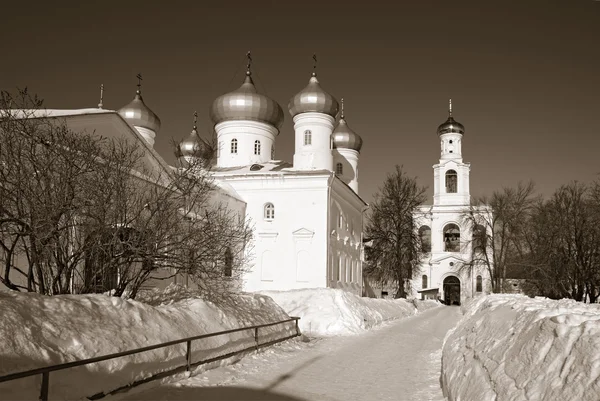 Christian orthodox male priory amongst snow, sepia — Stock Photo, Image