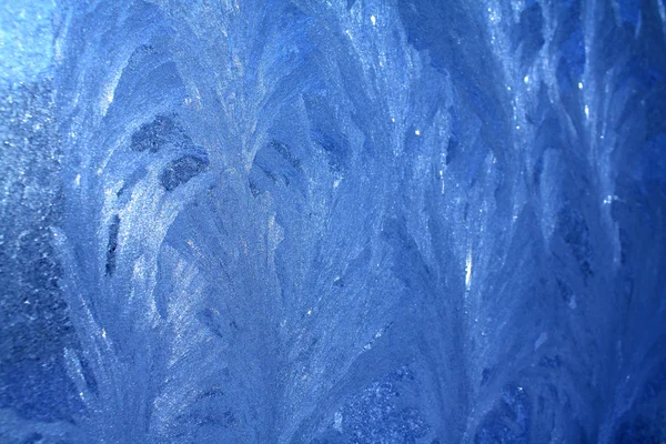 White crystals ice on winter window Royalty Free Stock Photos