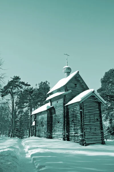 Wooden chapel in winter village — Stock Photo, Image