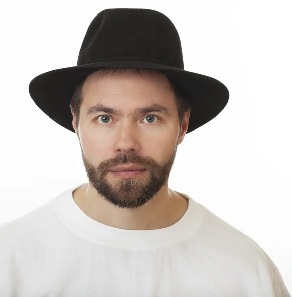 Человек с бородой в еврейской шляпе коленом . — стоковое фото