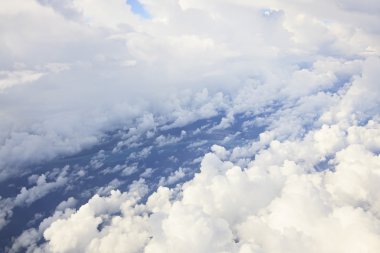 Cumulus clouds over the Atlantic Ocean (type of aircraft). Cuba.