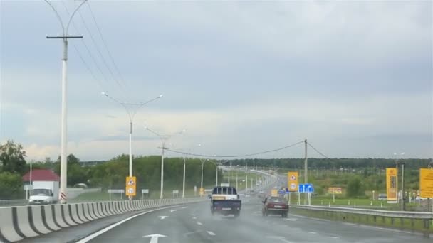 Driving on the road after rain (highway M-52). Russia. — Stock Video