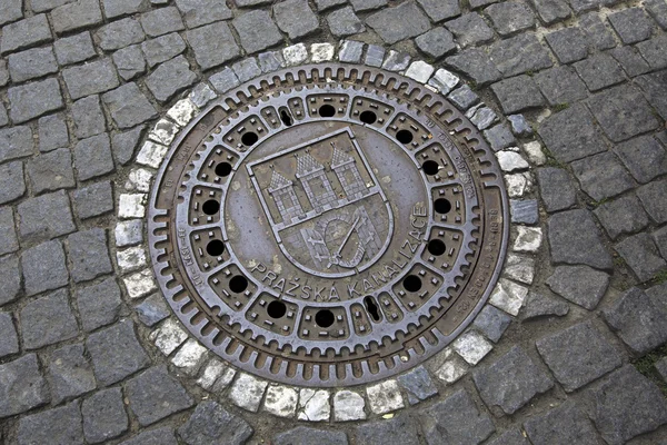 Manhole in the historical centre of Prague. — Stock Photo, Image