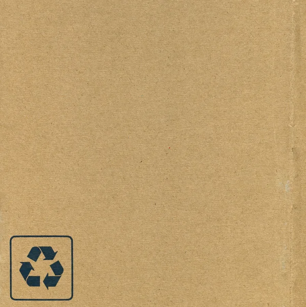 Символ переробки на картоні — стокове фото