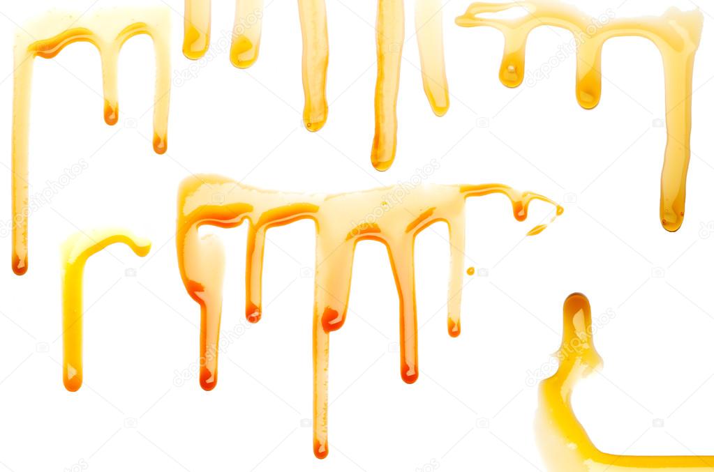 Caramel syrup on white background