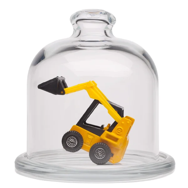 Toy loader in a glass dome — Stock Photo, Image