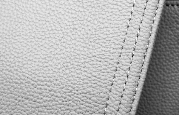 Texture of white leather with white stitching — Stock Photo, Image