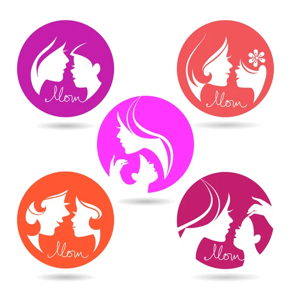 Set of mother and baby silhouette symbols — Stock Vector