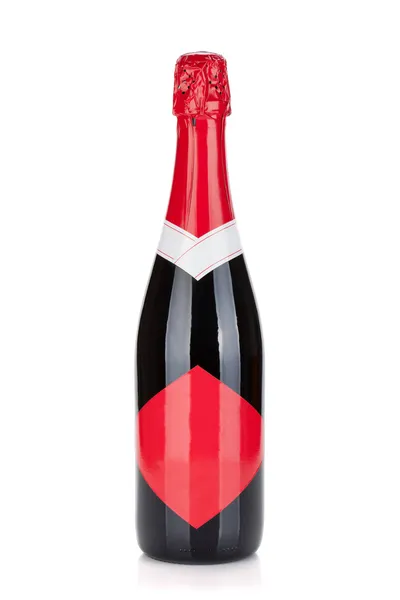 Láhev šampaňského s červenou etiketou — Stock fotografie