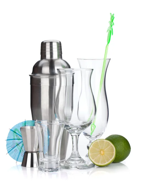 Cocktail shaker, glasses, utensils and lime — Stock Photo, Image