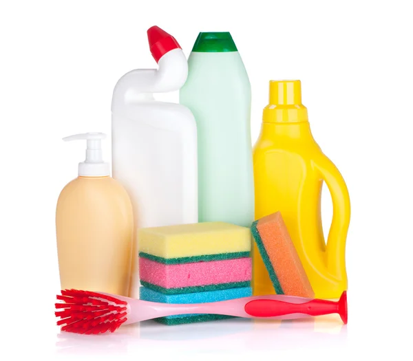 Plastic bottles of cleaning products, sponges and brush — Stock Photo, Image