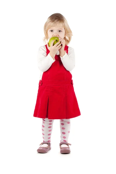Baby girl eating apple — Stock Photo, Image