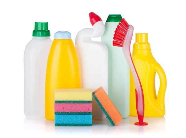 Plastic bottles of cleaning products, sponges and brush — Stock Photo, Image