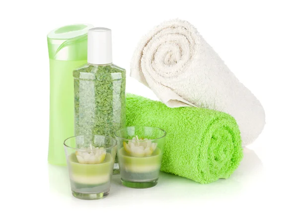 Bathroom bottles, towels and candles — Stock Photo, Image