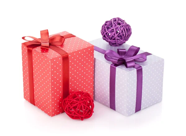 Colorful gift boxes with ribbon and bow and christmas decor — Stock Photo, Image