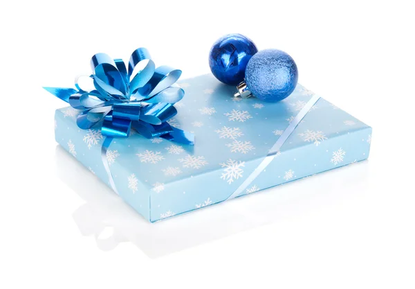 Christmas gift box and baubles — Stok fotoğraf