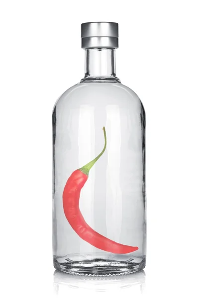 Bottle of vodka with red chili pepper — Stock Photo, Image