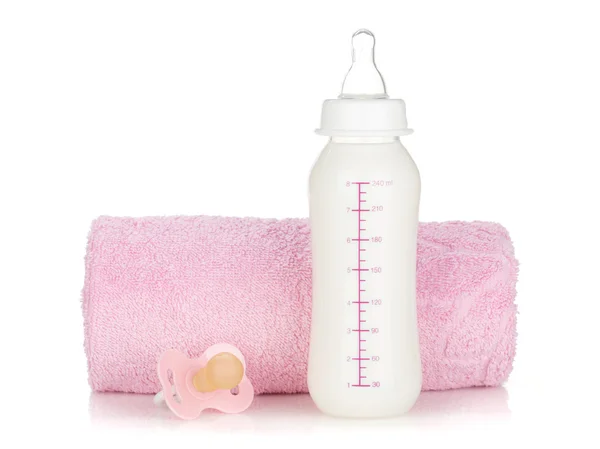 Baby bottle, pacifier and towel — Stock Photo, Image