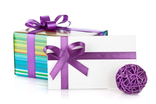 Colorful gift box and letter with ribbon and bow — Stock Photo, Image