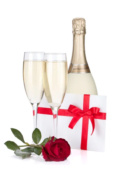 Two champagne glasses, letter and rose — Stock Photo, Image