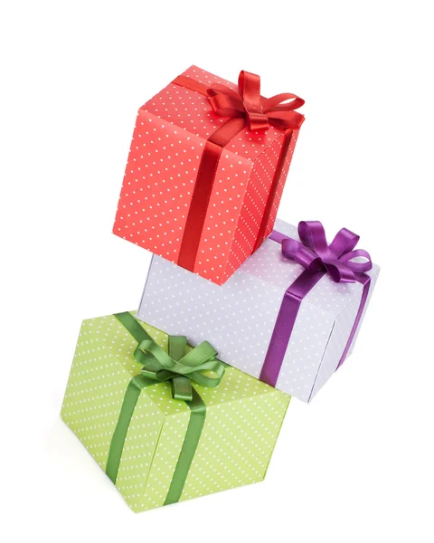 Tre gåva lådor med band och rosett — Stockfoto