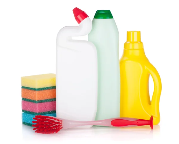 Plastic bottles of cleaning products, sponges and brush — Stock Photo, Image