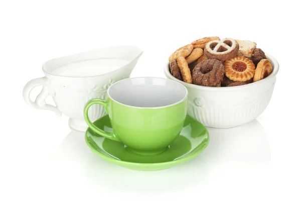 Various cookies, milk and tea cup — Stock Photo, Image