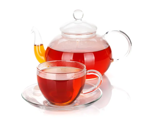 Glass teapot and cup of black tea — Stock Photo, Image