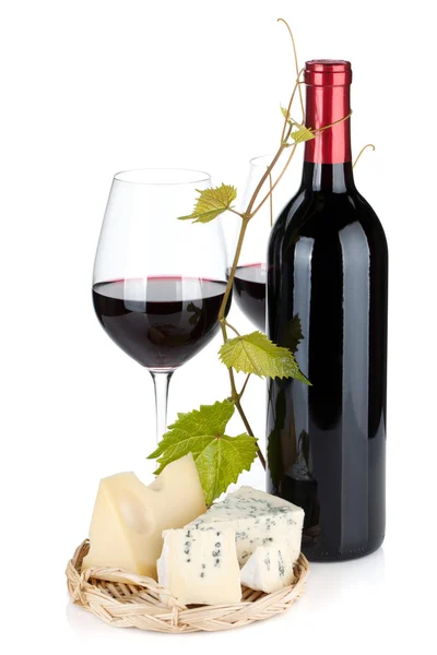 Red wine bottle, glasses and cheese — Stock Photo, Image