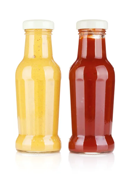 Гірчиця і скляні пляшки кетчупу — стокове фото