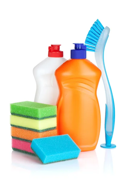 Plastic bottles of cleaning products, sponges and brush — Stock Photo, Image