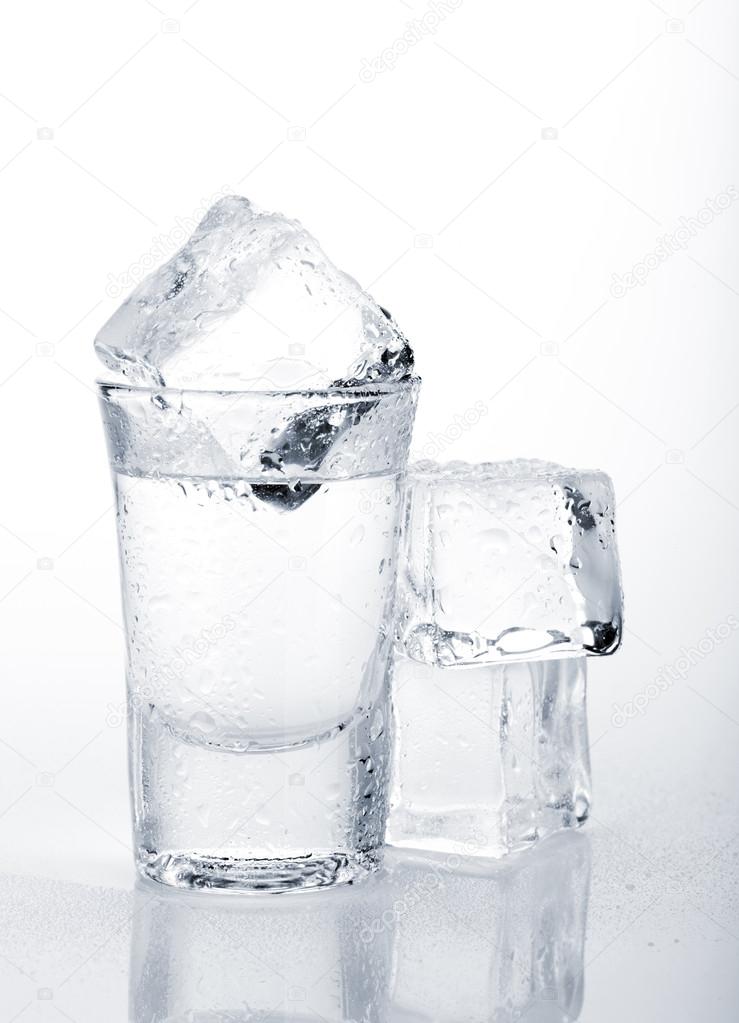 Vodka shot with ice cubes