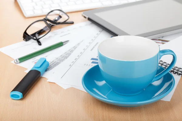 Empty cup on contemporary workplace — Stock Photo, Image