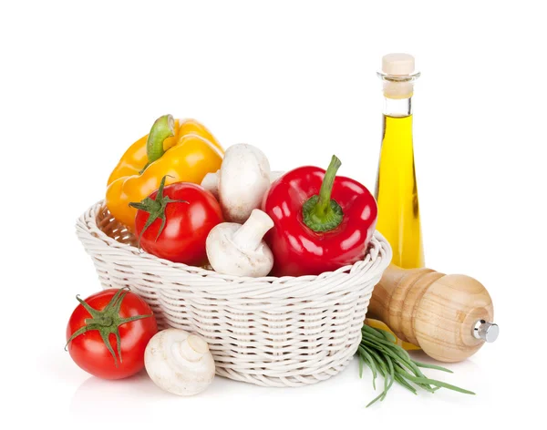 Fresh vegetables and mushrooms with olive oil and pepper shaker — Stock Photo, Image