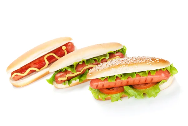 Drie hotdogs met verschillende ingrediënten — Stockfoto