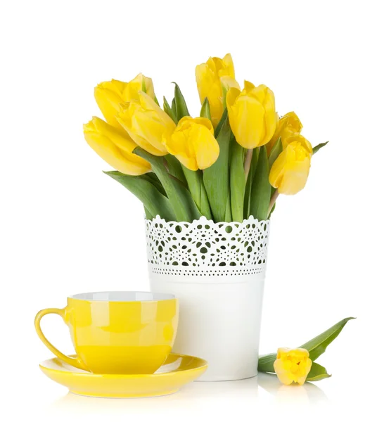 Yellow tulips and tea cup — Stock Photo, Image