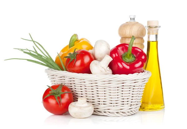 Fresh vegetables and mushrooms with olive oil and pepper shaker — Stock Photo, Image