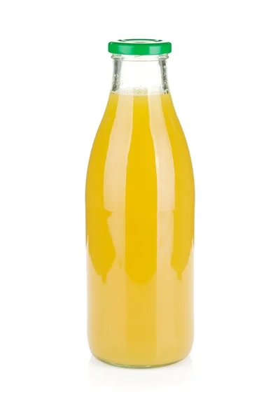 Szklana butelka soku ananasowego — Zdjęcie stockowe