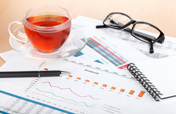 Tea cup on contemporary workplace