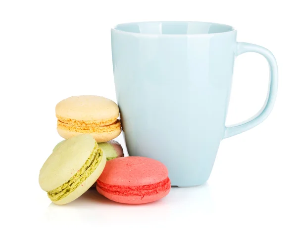 Colorful macarons and coffee cup — Stock Photo, Image