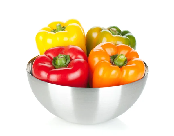 Čtyři papriky v misce — Stock fotografie