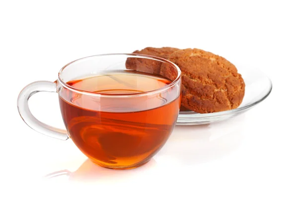 Glass cup of black tea with homemade cookies — Stock Photo, Image