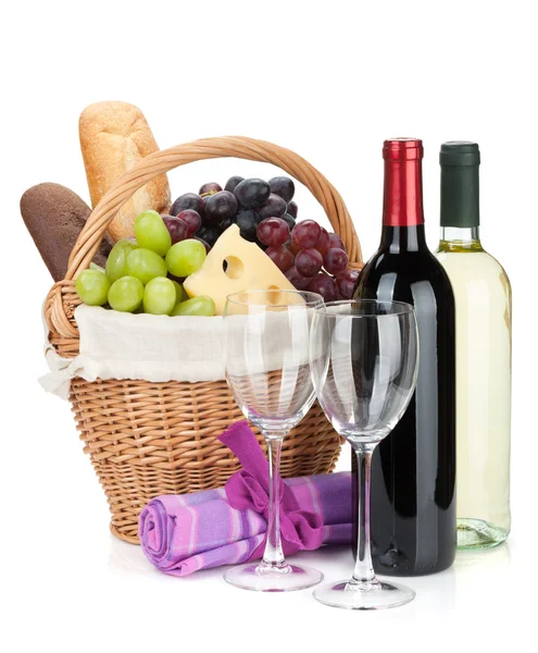 Picnic basket with bread, cheese, grape and wine bottles — Stock Photo, Image