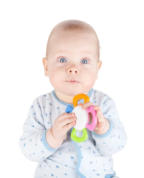 Cute baby boy is holding toy — Stock Photo, Image