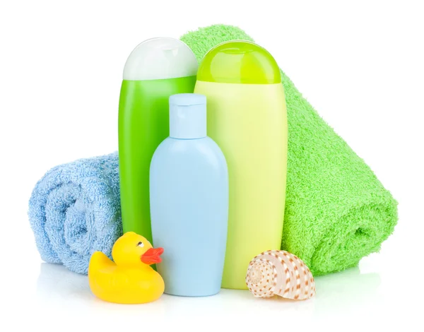 Bath bottles, towel and rubber duck — Stock Photo, Image