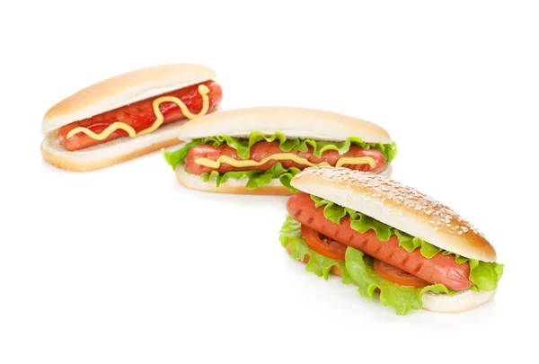 Drei Hot Dogs mit verschiedenen Zutaten — Stockfoto