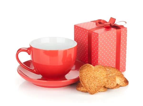 Red coffee cup and heart shaped cookies and gift box — Stock Photo, Image